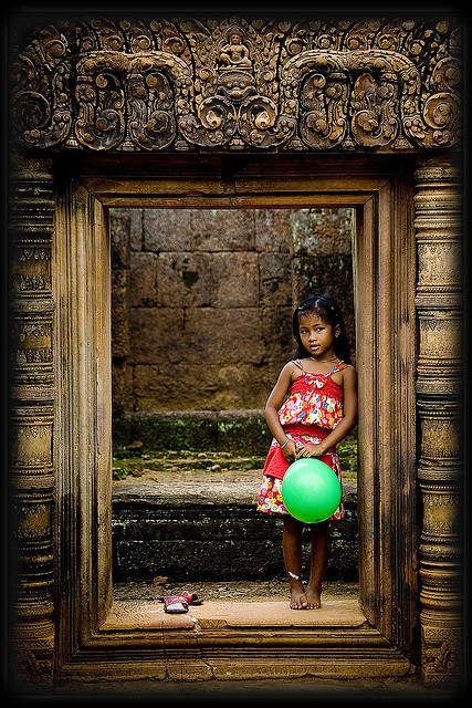 Girl with balloon at Angkor Wat, Cambodia by Eric Lafforgue on Flickr.