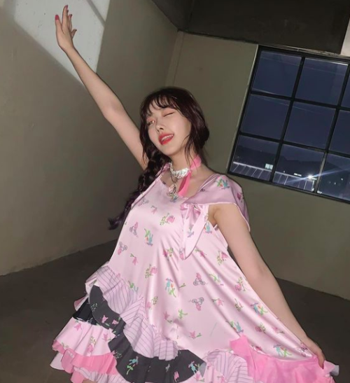 Momoland’s Nayun on instagram wearing NATASHA ZINKO pink printed sundress £865 [mod