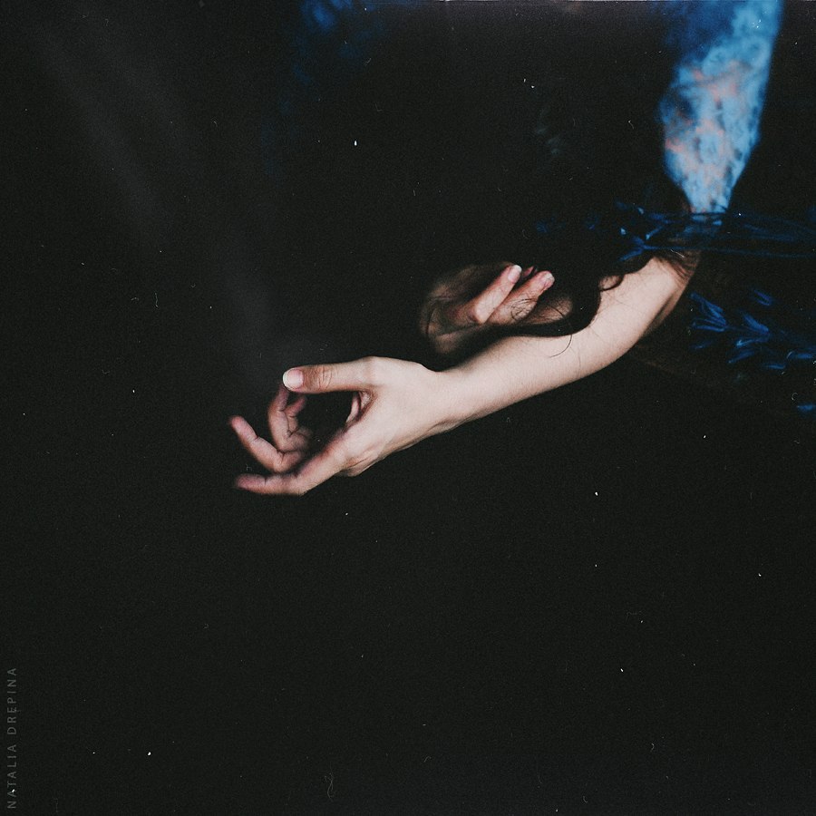 Her hands are the cradle of sorrow  by Natalia Drepina