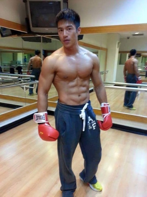 xclusiv4ejc:  Who is this #Asian #MuscularDemigod?   He is Yi Tin Chen, a 26-year-old living in Taipei. Honour as The Hottest Bean Curd Seller, a promotional model, a muscle worshipper, a dog lover and good connection with babies.  What more could you