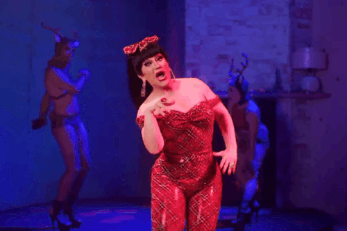 GIFset Of DeLa In The Tartan Pantsuit That Nobody Asked For