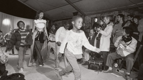 showstudio:  Martin Margiela’s Spring/Summer 1990 show located on a playground in the 20th arrondissement of Paris where local kids were invited.by Jean-Claude Coutaus