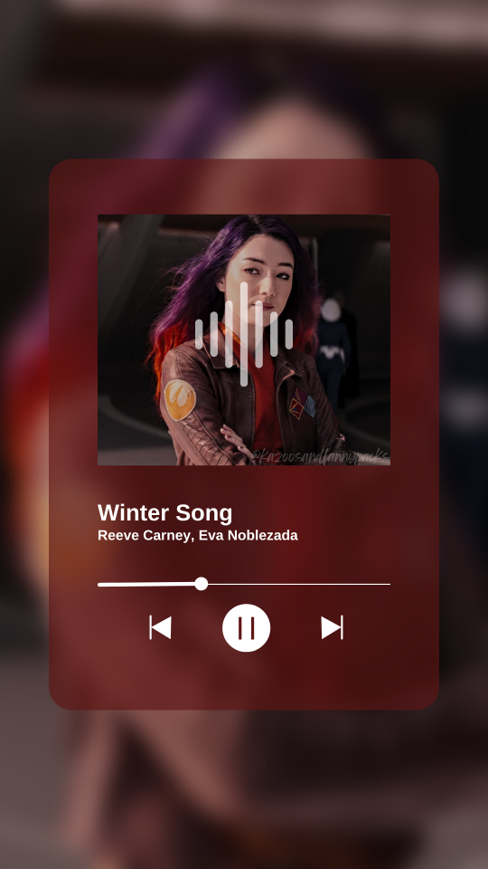 A fake screenshot of a song playing on a music player app. This one shows Sabine Wren from the Ahsoka series as the album cover, with the playing track being Winter Song by Reeve Carney and Eva Nobelzada.