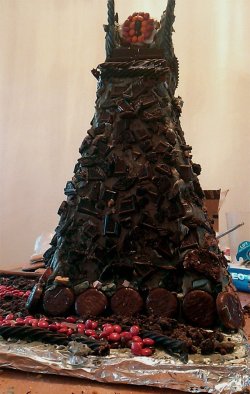 dorkly:  The Chocolate-y Eye of Sauron “You know of what I speak, Gandalf: a great Eye, lidless, wreathed in Hershey.”