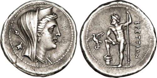 Drachma from Bruttium (Locri or Croton).  On the obverse, Hera Lacinia; on the reverse, Zeus with hi