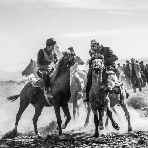 Portraits of ethnic Tajik, Kazakh, Russian, Uyghur, and Kyrgyz men in various hats in Xinjiang.Photo