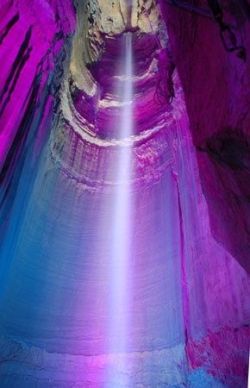 sixpenceee:Ruby Falls is a 145-foot high underground waterfall located within Lookout Mountain, near Chattanooga, Tennessee