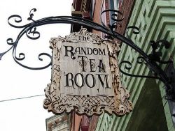 tea-andbooks:  Who wouldn’t check out this place just from the sign?! =D 