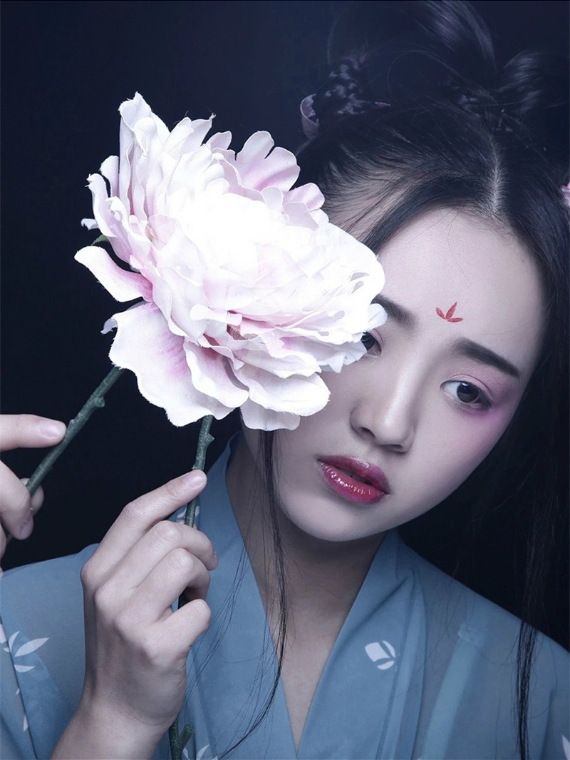 fuckyeahchinesefashion:  How to do a 双环髻 Shuanghuan Ji. This hairstyle was