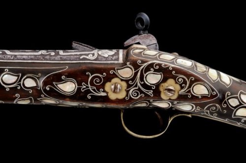 peashooter85:A silver and mother of pearl decorated flintlock carbine originating from the Ottoman E