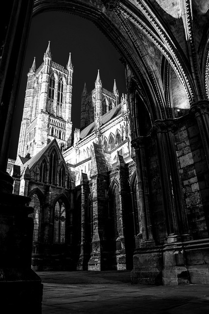 pixelglo-photography:  Shadows Of History on Flickr. Lurking within the shadows of history, peering up towards the spires of Lincoln Cathedral as night falls. 