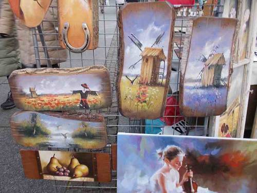 Paintings on pieces of wood.