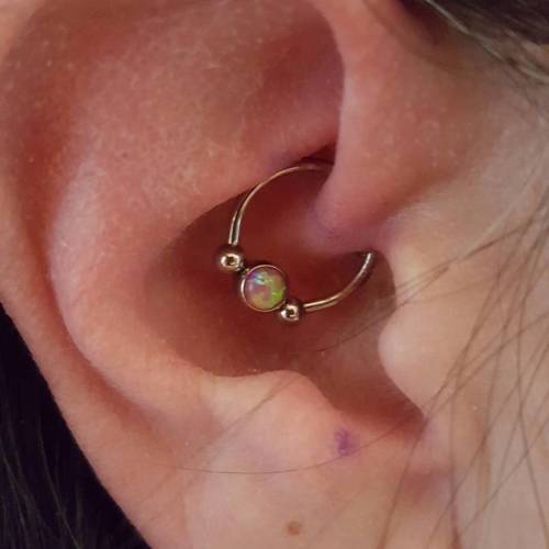 A fun little daith piercing with a @industrialstrength opal #industrialstrength #ghostwolftattoo #pi