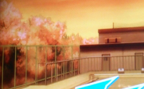tottorin:  Free! Season 2 PV Caps — a gratuitous rainbow, sakura trees blooming in the background, a scene of Rin and Haruka swimming.  