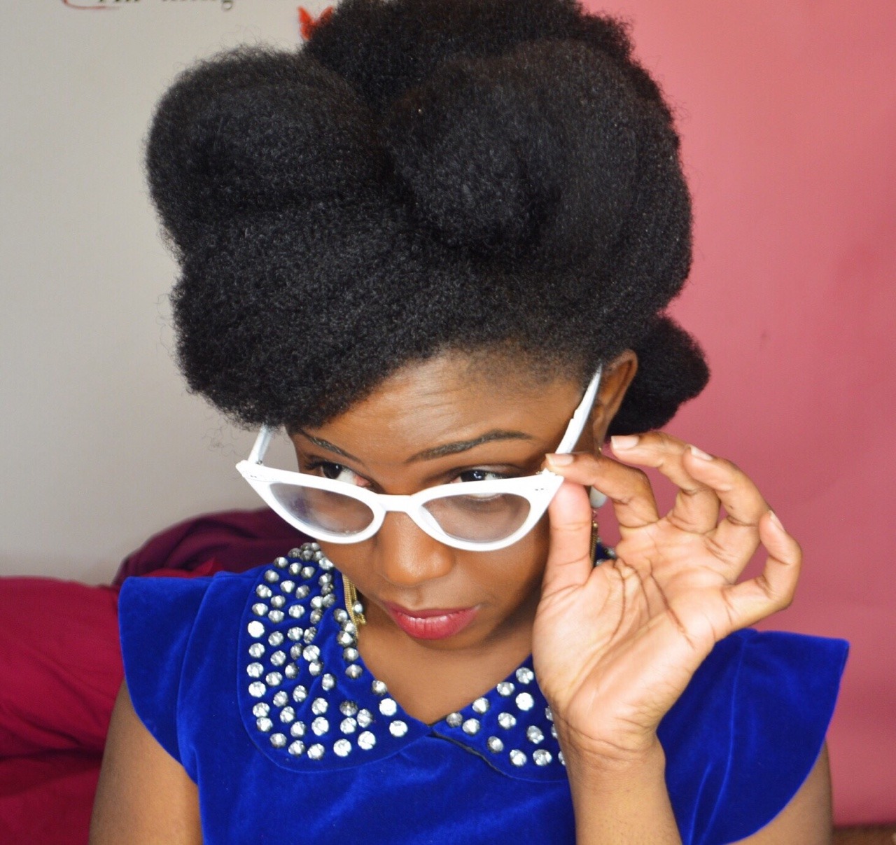 westafricanbaby:  1950s inspired updo on 4c hair 😊. Tutorial on my YouTube channel😋
