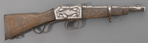 A silver wire inlaid Afghan Khyber Pass Martini action carbine, late 19th century.