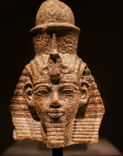 Portrait head of Amenhotep III, shown wearing the double crown and ceremonial beard.  Artist unknown