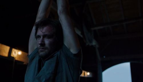 Taken S01E01 part 1 of 2 Bryan Mills (Clive Standen) finds himself hung by his wrists, his shirt rip