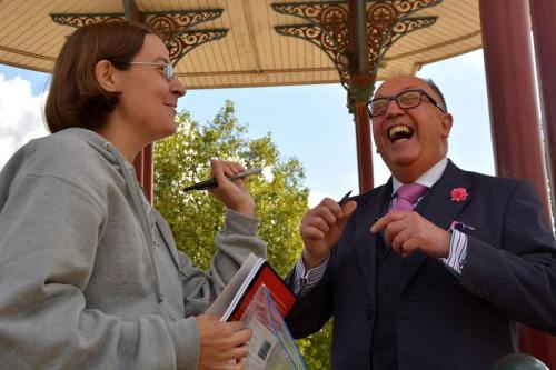 Ms Falk sharing a hearty laugh and happy memories at Clapham Common bandstand, with Mr. David Stuart