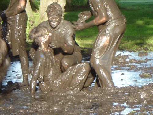 Youth group in the mud