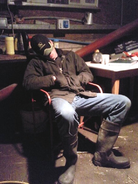 rubberbootman:lesbotteux:Sleepy.Kip was worn out after a long day at work.  Problem was if he went home, his mother would make him take his boots off at the door.  He did not want to take his rubber boots off and so he often falls asleep in the shed. 