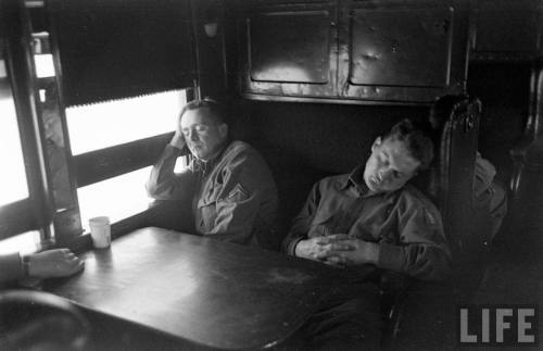 Napping aboard a troop train(Myron Davis. 1943)