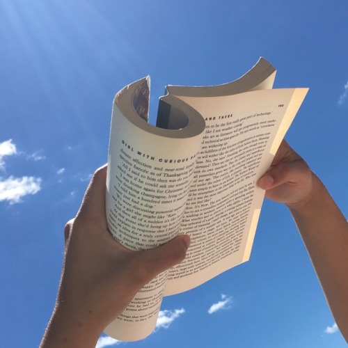 day 3 !!! me n rachel reading to each other on the beach (WHILST my ass was getting burnt unbeknowns