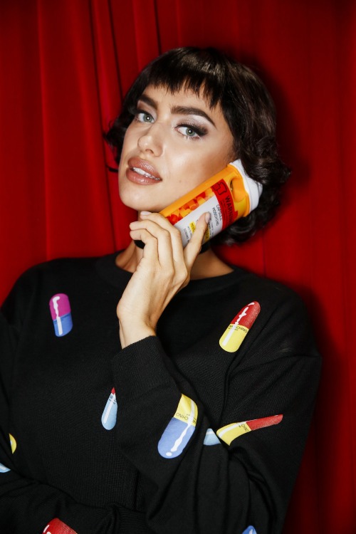 crfashionbook:  Irina Shayk makes a phone call before the Moschino Spring 2017 show