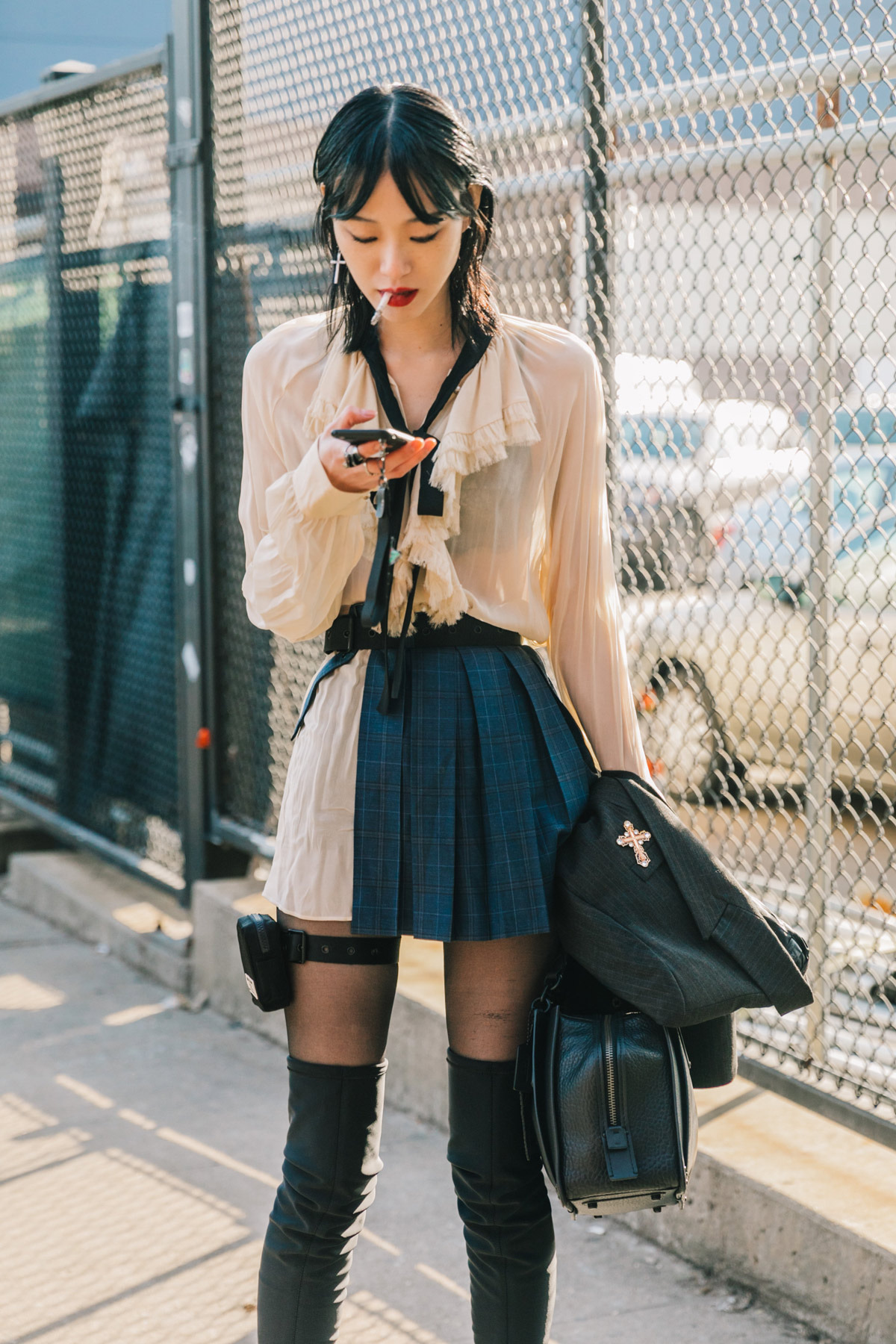 Model Sora Choi walking on the street outside the BOSS show during New York  Fashion Week 