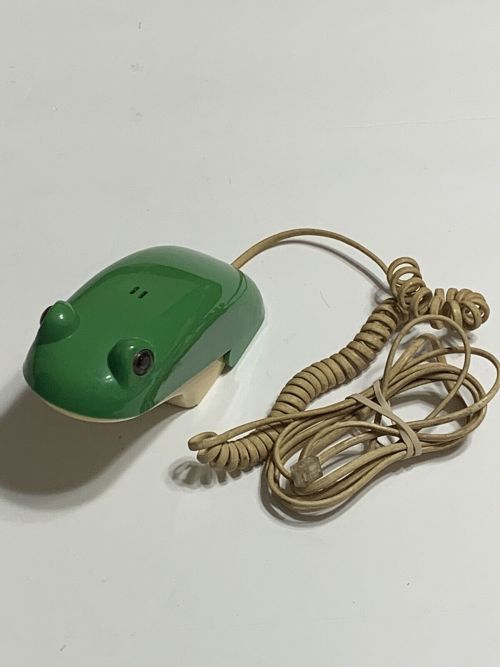 littleguymart: (source)[image description: a photo of a landline phone designed to look like a small