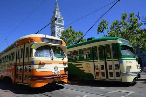 Historic Street Cars run on the F &amp; E Lines in San Francisco from the Ferry Terminal Buildin