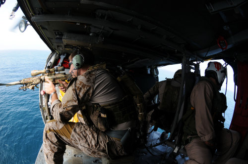 house-of-gnar:  Navy SEALs, assigned to Combined Joint Special Operations Task Force - Afghanistan provide security as a U.S. Army UH-60 Black Hawk drops off personnel during a clearing operation in Shah Wali Kot district, Kandahar province, Afghanistan.N