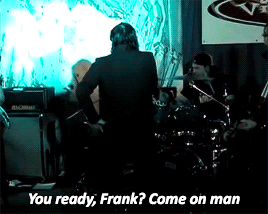 teachmetokill:  (x) gerard waiting for frank to get his guitar ready for the next song in a very normal and regular manner absolutely nothing to see here no sir, 2004