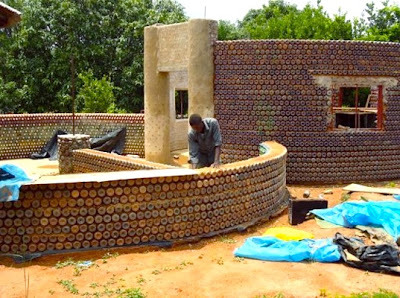 mylittlerewolution:  Did you know that you can make houses out of plastic bottles? By filling them with sand, and molding them together with mud or cement, the walls created are actually bullet proof, fire proof, and will maintain an comfortable indoor