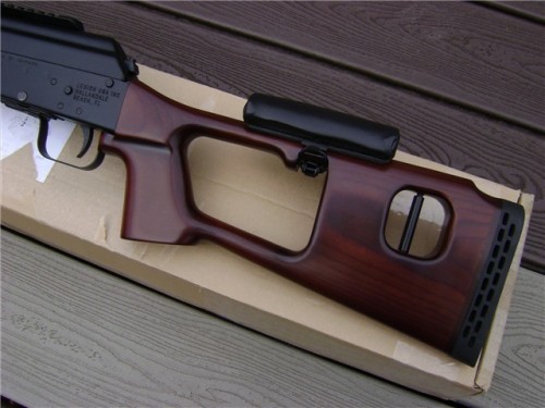 gunrunnerhell:  Saiga 12 IZ-406 Dragunov A limited edition and production run from Legion, this is a mocked up Saiga 12 that mimics the SVD Dragunov, albeit a very poor imitation. A special wood stock and handguard set give the look and general feel of