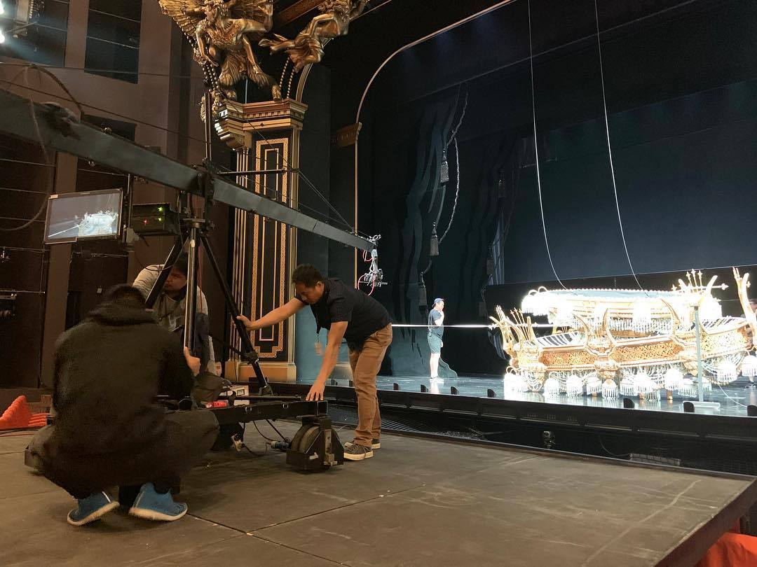 A collapsed chandelier on the stage