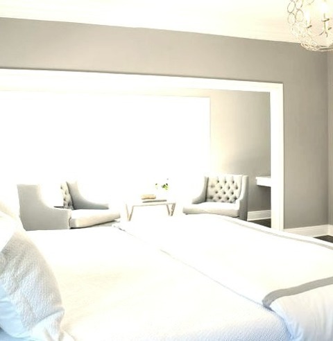 Master In New YorkExample Of A Huge Transitional Master Dark Wood Floor Bedroom Design With Gray Walls
