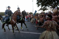 rishu-jpn:  Brazilian police clash with indigenous groups protesting World Cup 2014. 