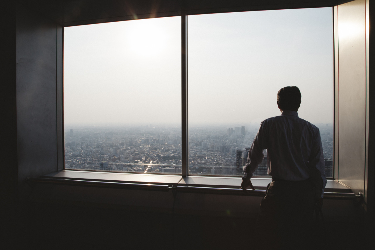 A Japanese salaryman stop and take a break to look at Tokyo skyline this afternoon. May 27, 2015
Photo: Richard Atrero de Guzman