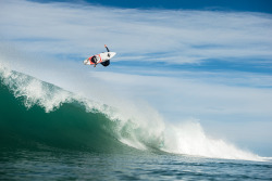 thisisaboutridingwaves:  Free at last. Dane Reynolds flying above Corey Wilson. Morroco. Surfing Magazine 