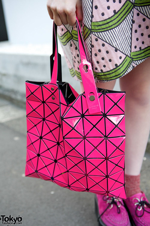 18-year-old Nori on the street in Harajuku wearing an I Am I watermelon print dress with pink Nadia 