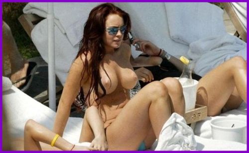 evilge:  LOOKING GOOD LINDSY WITH YOUR FAKE TITS !!!!!!! 