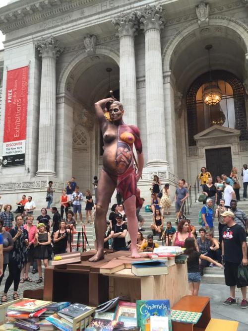 perceval23:   Amanda Palmer as a statue for a children’s book benefit at the New York Public Library.  And here’s David Hirst’s Verity, that she’s recreating. 