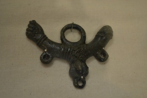 religioromana: A wonderful example of a copper alloy ‘penis and fist’ pendant, at The Lu