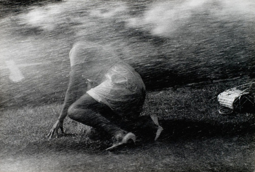 hauntedbystorytelling: Charles Moore :: A woman at a Civil Rights protest getting fire-hosed, Birmin