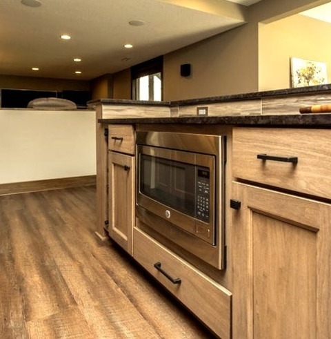Walk Out - Craftsman BasementLarge Craftsman Walk-out Basement Idea With A Beige Floor, Gray Walls, A