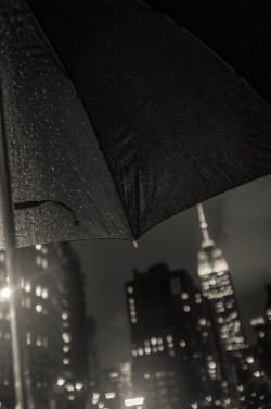 bagnostian:  &ldquo;the last forty days have been rain&rdquo; under an umbrella in flatiron. nyc. (Fuji X100) 