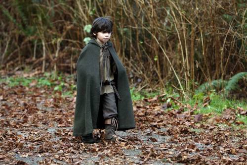 sailing-the-glittering-seas:Just look at this adorable kid! The little cape, the boots. He’s the cut