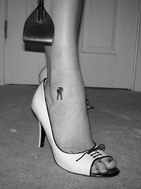 okiecuckold:Simple elegance, Her open-toed heels for your tongue, the toe ring for Her lovers, Her k