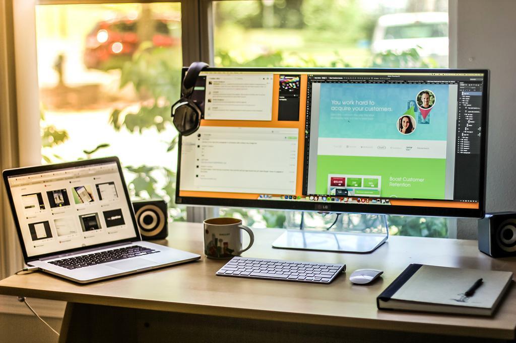 Justin Kwak’s desk with massive 34" screen.